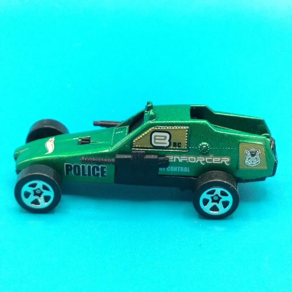 Hot Wheels Enforcer Riot Control Police Car Green Diecast Vehicle Mattel